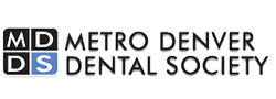 The image is a logo for the Metro Denver Dental Society, featuring text and a graphic design.